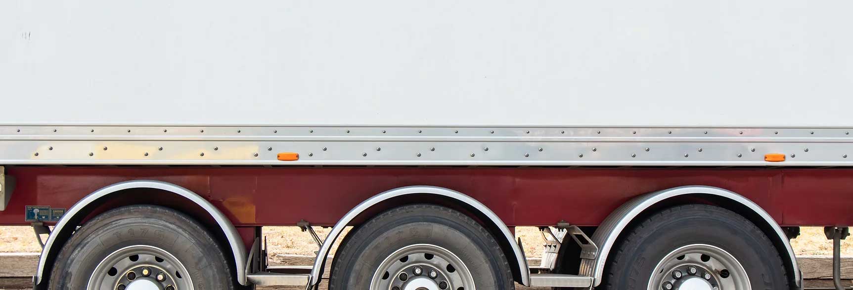 Chris Buckley Transport truck trailer side with wheels